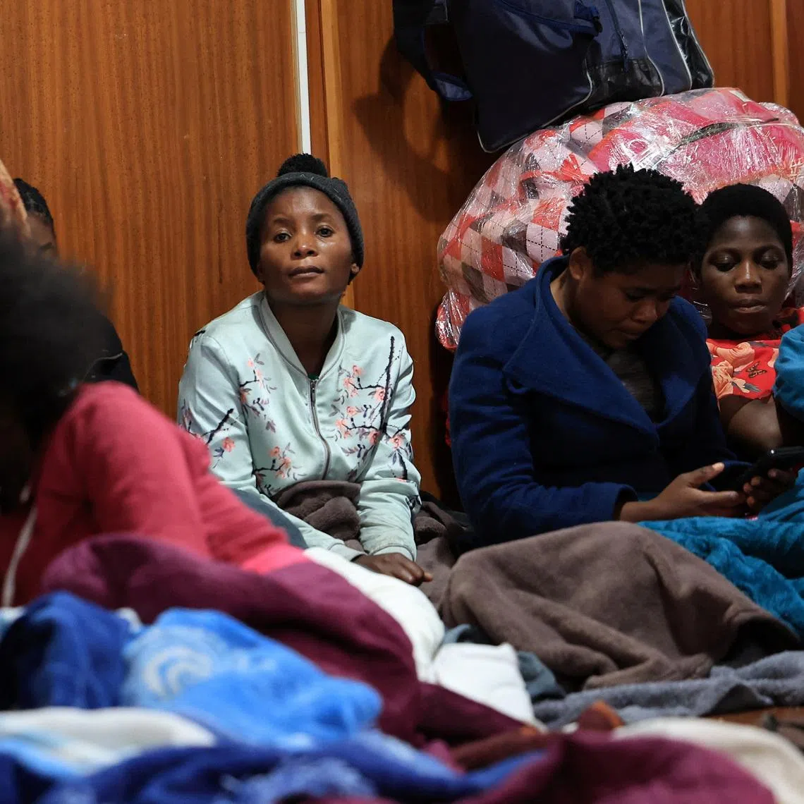 Displaced migrants shelter in a hall, following an escalation in anti-immigrant protests which heightened fears among foreign communities, in Kleinmond, South Africa, June 3, 2026. REUTERS/Esa Alexander