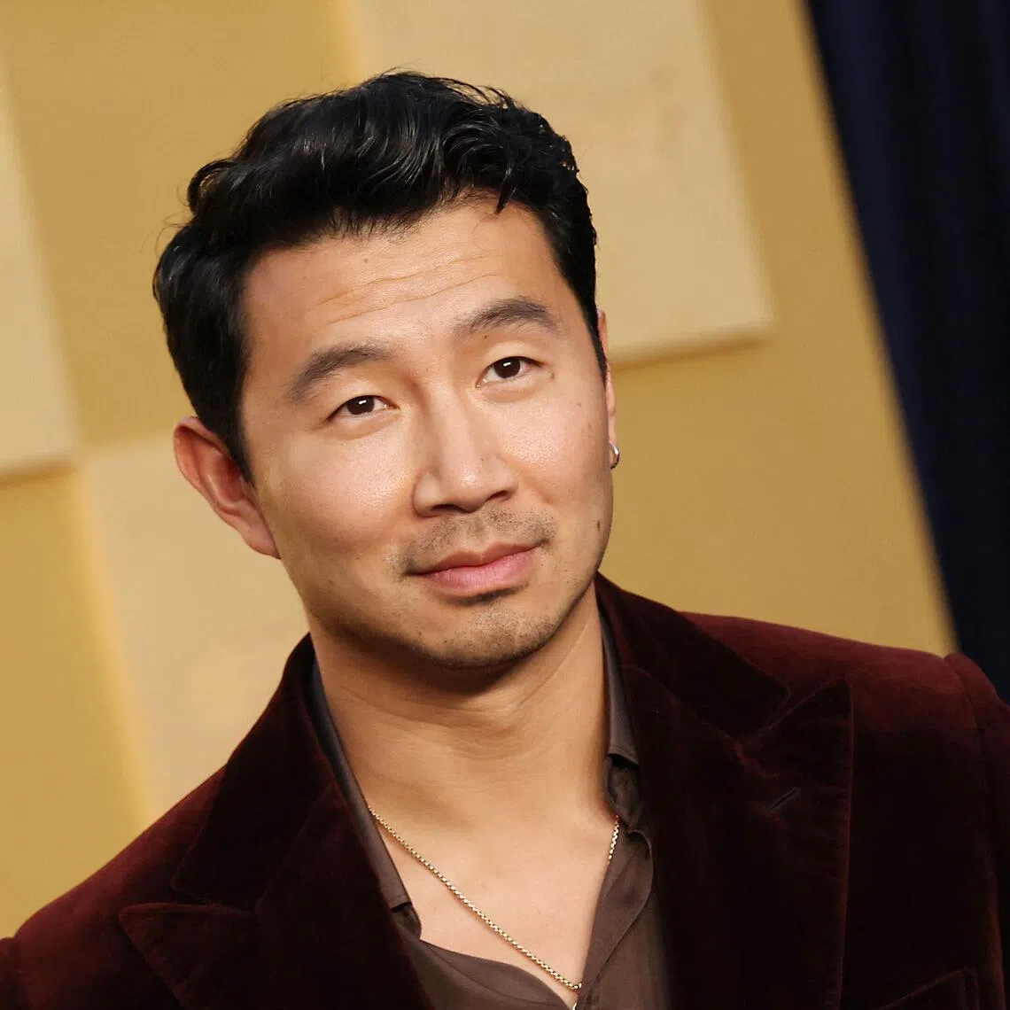 Canadian actor Simu Liu attends the premiere of Netflix's "In Your Dreams" at the Egyptian Theatre in Los Angeles, California on October 28, 2025. (Photo by Michael Tran / AFP)