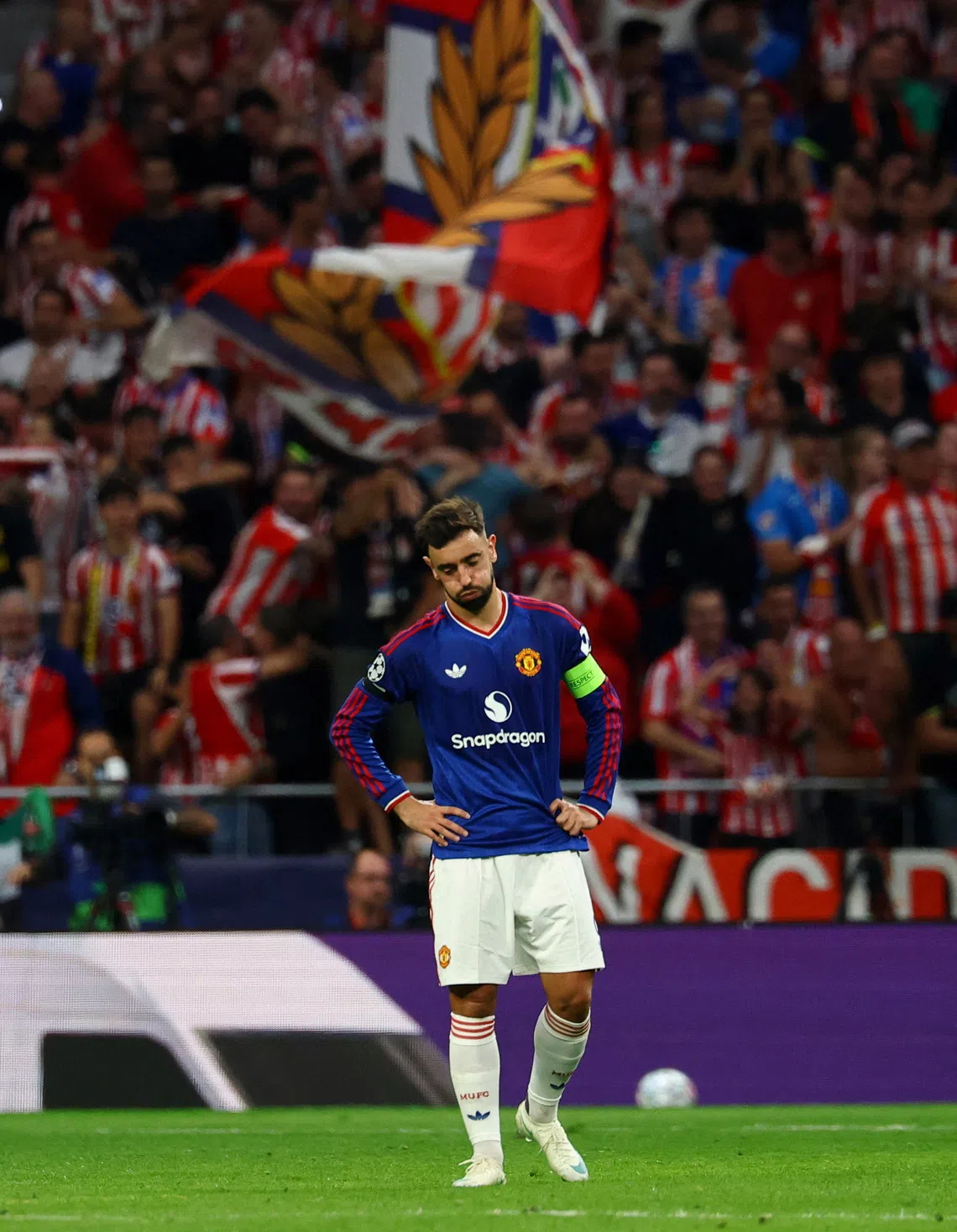 Manchester United’s Bruno Fernandes looking dejected after Atletico Madrid’s Ademola Lookman scores their second goal.