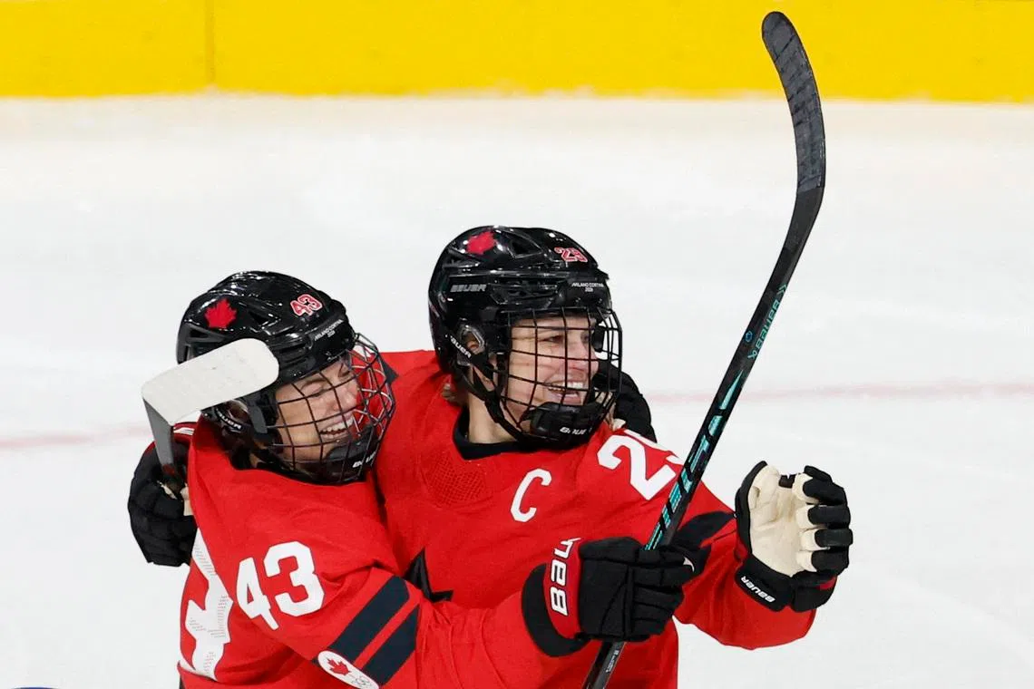 Milano Cortina 2026 Olympics - Ice Hockey - Women's Preliminary Round - Group A - Canada vs Czech Republic - Milano Rho Ice Hockey Arena, Milan, Italy - February 09, 2026. Kristin O'Neill of Canada celebrates scoring their first goal with Marie-Philip Poulin of Canada REUTERS/David W Cerny