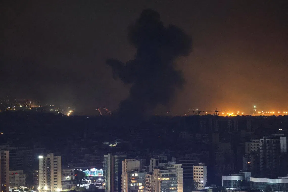 FILE PHOTO: Smoke billows over Beirut southern suburbs after a strike, amid the ongoing hostilities between Hezbollah and Israeli forces, as seen from Sin El Fil, Lebanon October 7, 2024. REUTERS/Mohamed Azakir/File Photo