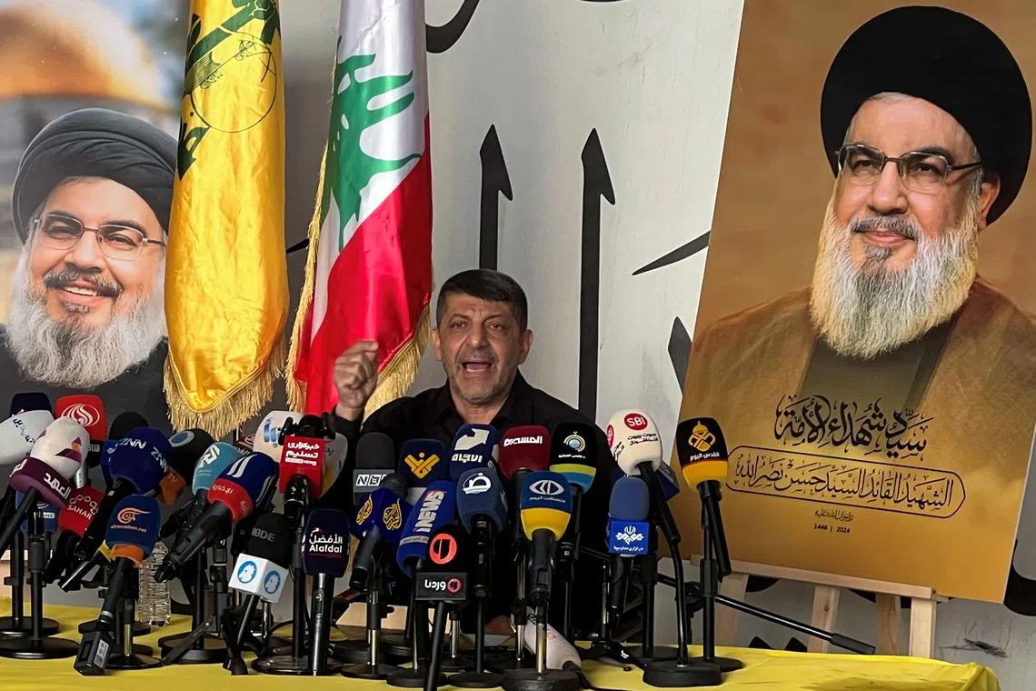 The head of Hezbollah's media office, Mohammad Afif, speaks during a press conference in Beirut's southern suburbs in Lebanon, amid the ongoing hostilities between Hezbollah and Israeli forces, November 11, 2024. REUTERS/Haider Kadhim