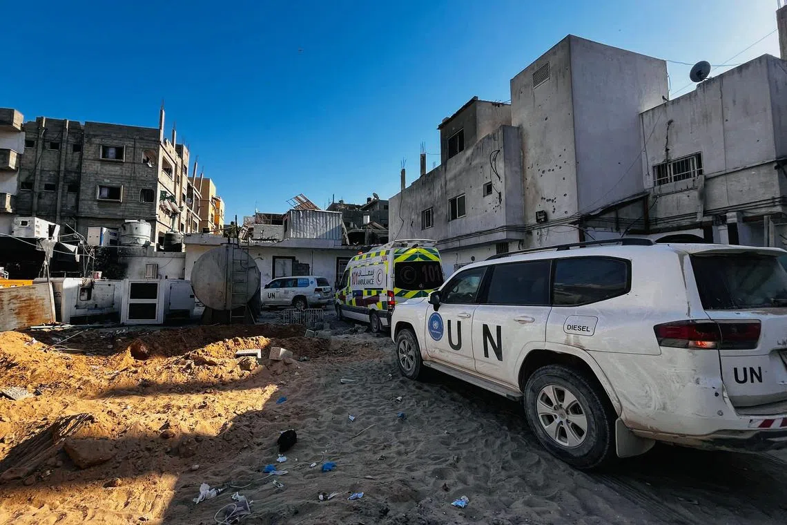 UN vehicles are seen as medics evacuate patients from the Kamal Adwan Hospital in Beit Lahia in the northern Gaza Strip on Oct 28 to al-Shifa hospital in Gaza City in a joint World Health Organisation and Palestinian Red Crescent initiative. 