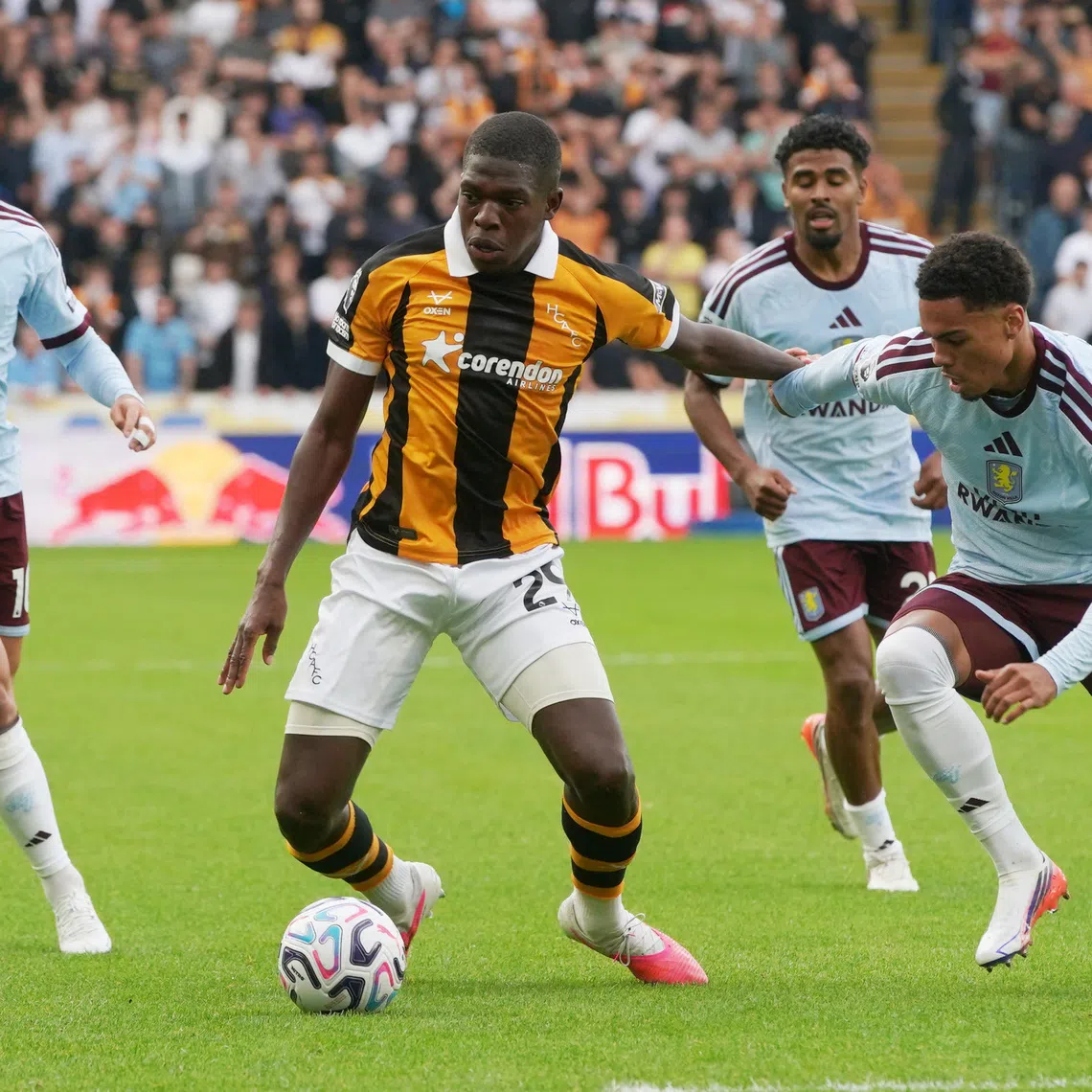 Soccer Football - Premier League - Hull City v Aston Villa - MKM Stadium, Hull, Britain - September 5, 2026 Hull City's Lucas Gourna-Douath in action with Aston Villa's George Hemmings REUTERS/Ian Hodgson