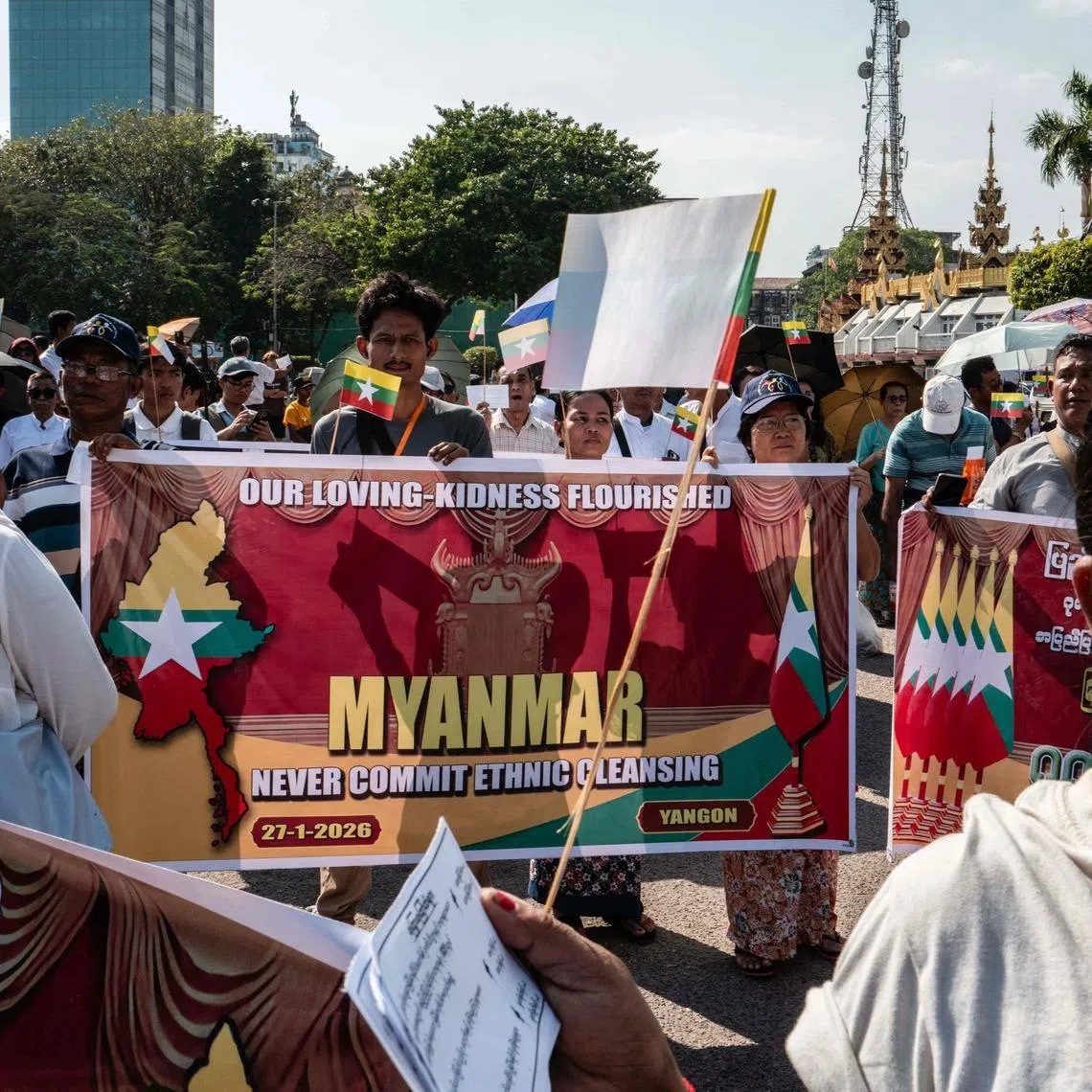 Myanmar nationalists hold banners in downtown Yangon as they rally against the country's prosecution for genocide against the Rohingya minority at the International Court of Justice on Jan 27.