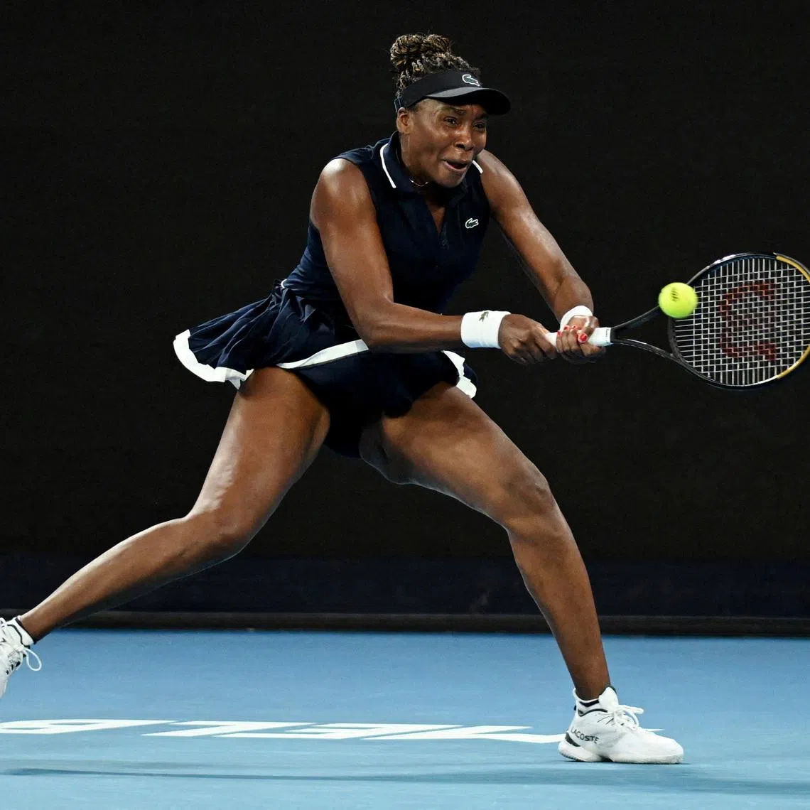 FILE PHOTO: Tennis - Australian Open - Melbourne Park, Melbourne, Australia - January 18, 2026 Venus Williams of the U.S. in action during her first round match against Serbia's Olga Danilovic REUTERS/Jaimi Joy/File Photo
