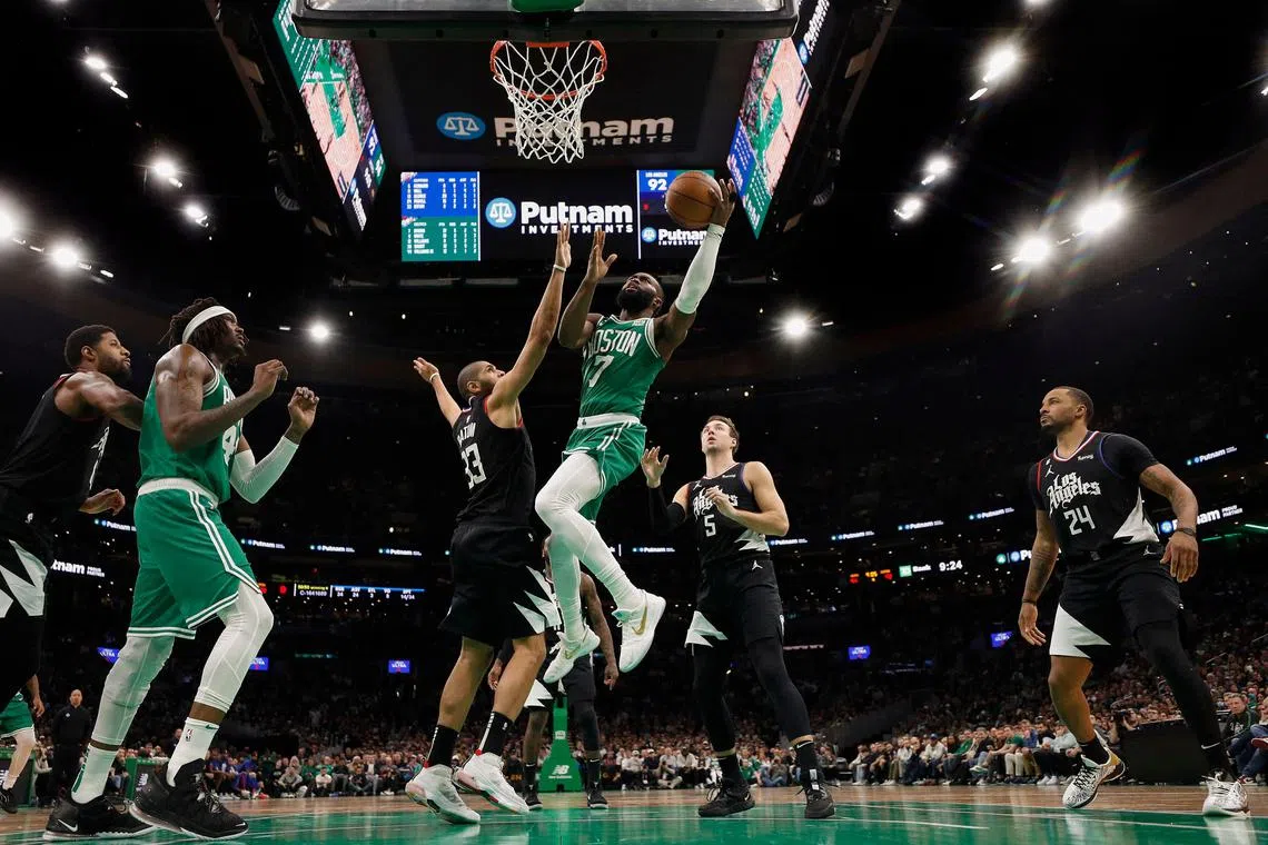 Jaylen Brown of the Boston Celtics drives to the basket during the second half at TD Garden on Dec 29, 2022.
