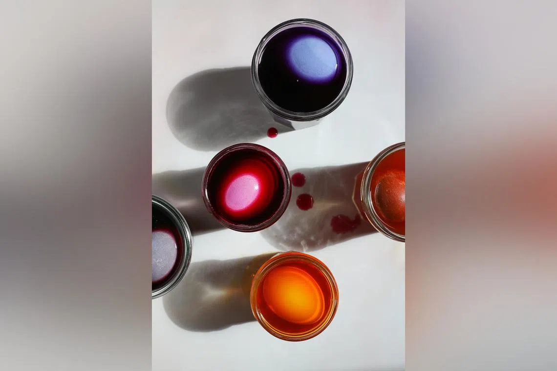 Eggs in a variety of dyeing colours. With costs high and supplies short, people are getting creative with Easter egg traditions. 