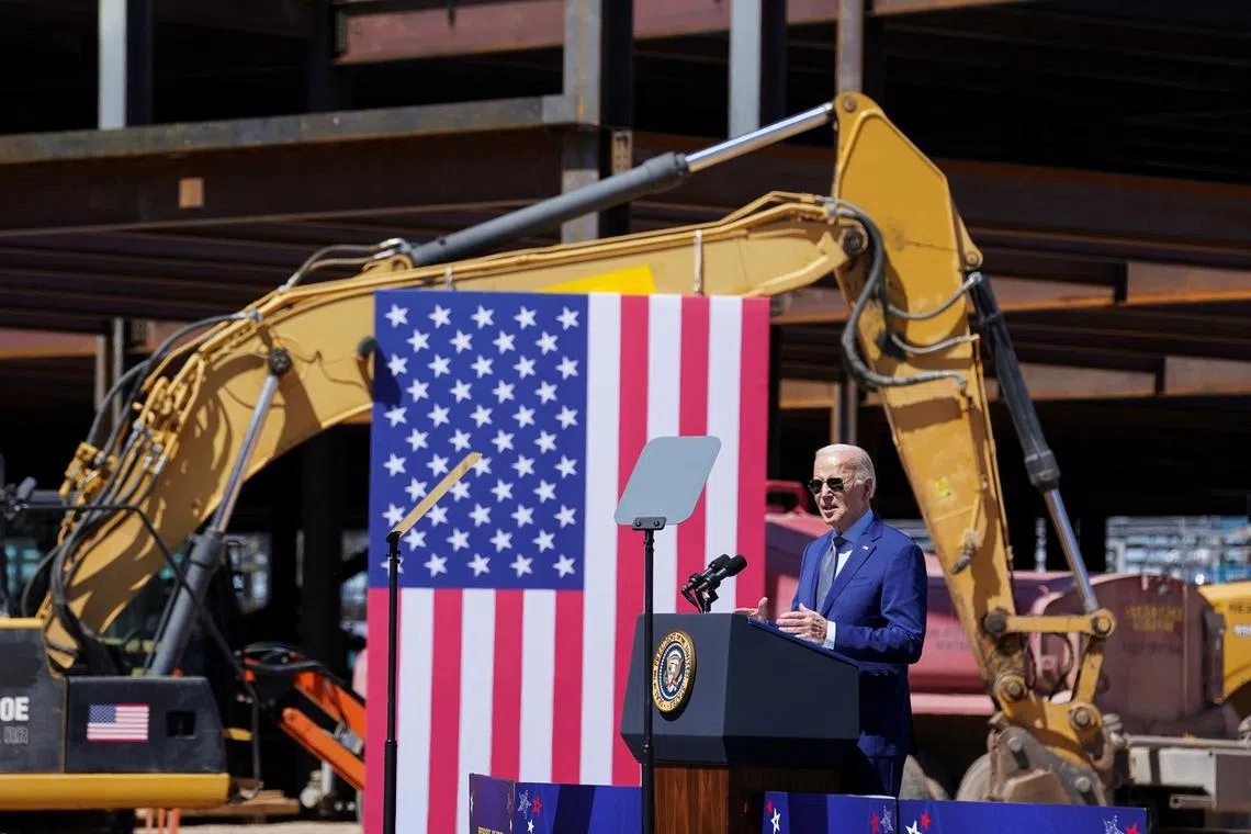 U.S. President Joe Biden speaks, as he announces a preliminary agreement with Intel for a major CHIPS and Science Act award, during a visit to the Intel Ocotillo Campus, in Chandler, Arizona, U.S., March 20, 2024.  REUTERS/Kevin Lamarque