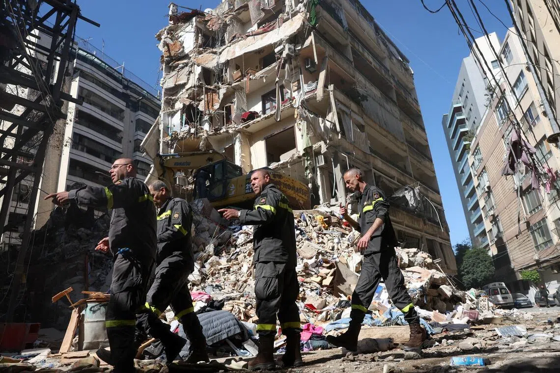 Rescuers work at the site of an Israeli strike carried out in Beirut, Lebanon.
