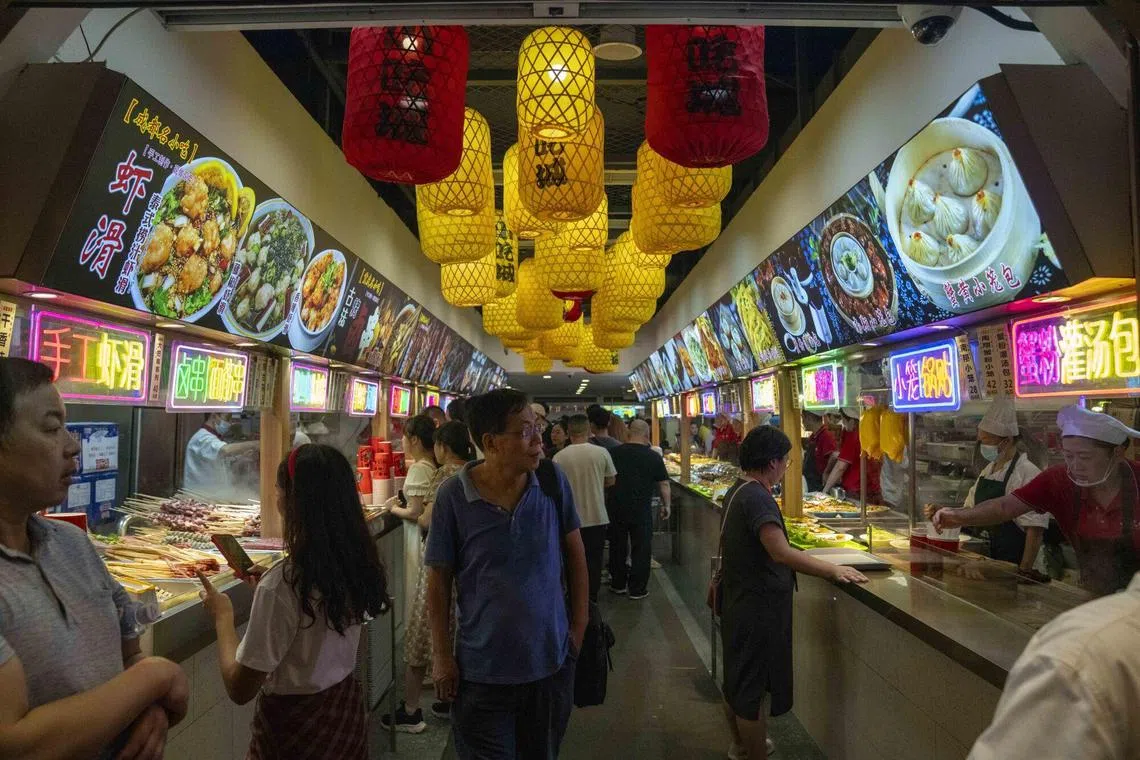 Food stalls at Yu Garden Bazaar in Shanghai, China, on Friday, Sept. 29, 2023. China's economy showed signs of a stronger recovery in September, according to a firm analyzing the global economy using satellite data. Source: Bloomberg