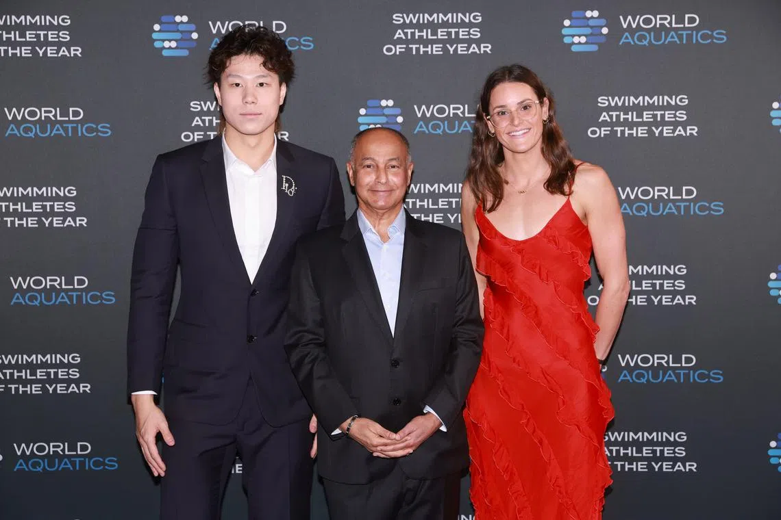 China's Qin Haiyang and Australia's Kaylee McKeown, pictured with World Aquatics president Husain Al-Musallam, have been named Best Male and Female swimmer of the Year by the world body.