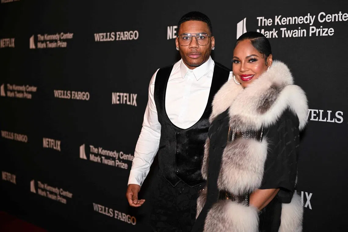 US rapper Nelly (L) and US singer-songwriter Ashanti at the 25th Annual Mark Twain Prize For American Humor at the John F. Kennedy Center for the Performing Arts in Washington, DC, on March 24, 2024. 