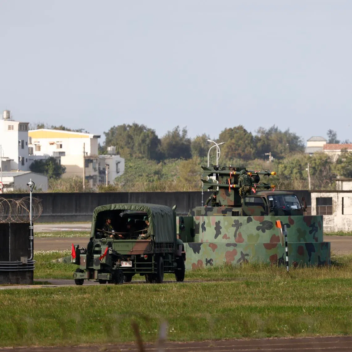 Taiwan's military deploying an air defence missile system inside an air base in Hsinchu on Dec 29.