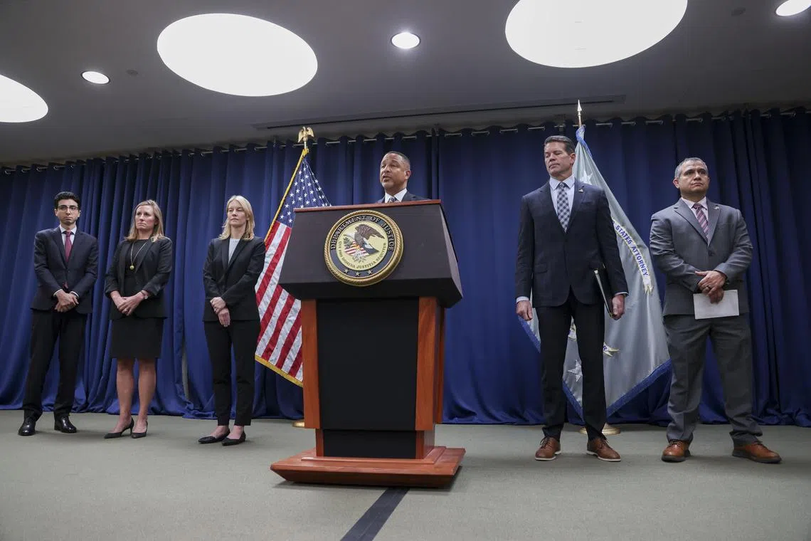 Mr Breon Peace (centre), US Attorney for the Eastern District of New York, addressing a press conference on the arrest of former Abercrombie and Fitch CEO Mike Jeffries, along with Matthew Smith and James Jacobson, on charges related to sex trafficking, on Oct 22.