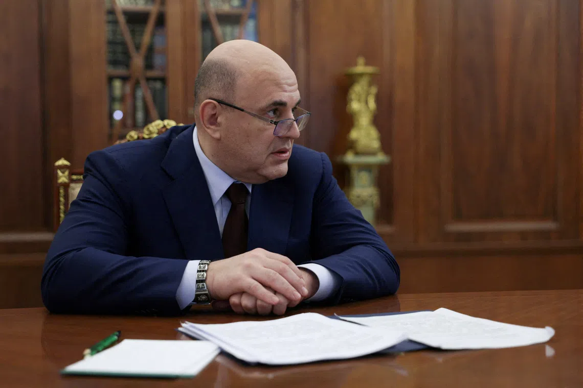 FILE PHOTO: Russian Prime Minister Mikhail Mishustin attends a meeting with President Vladimir Putin at the Kremlin in Moscow, Russia February 7, 2025. Sputnik/Gavriil Grigorov/Pool via REUTERS