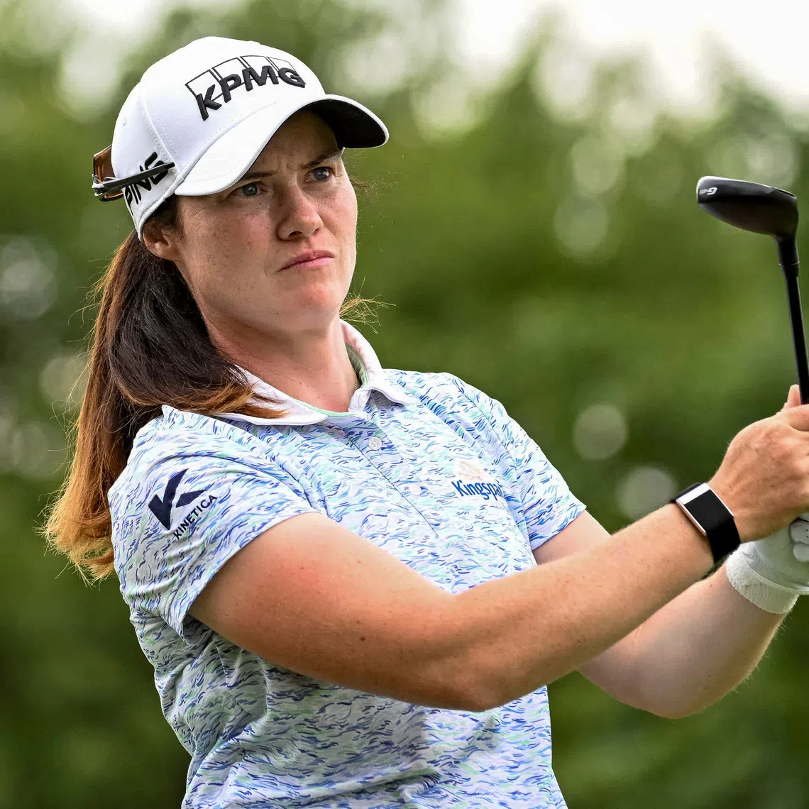 FILE PHOTO: Aug 23, 2025; Mississauga, Ontario, CAN;  Leona Maguire watches her tee shot at the third hole during third round play at the CPKC Women's Open golf tournament. Mandatory Credit: Dan Hamilton-Imagn Images/File Photo
