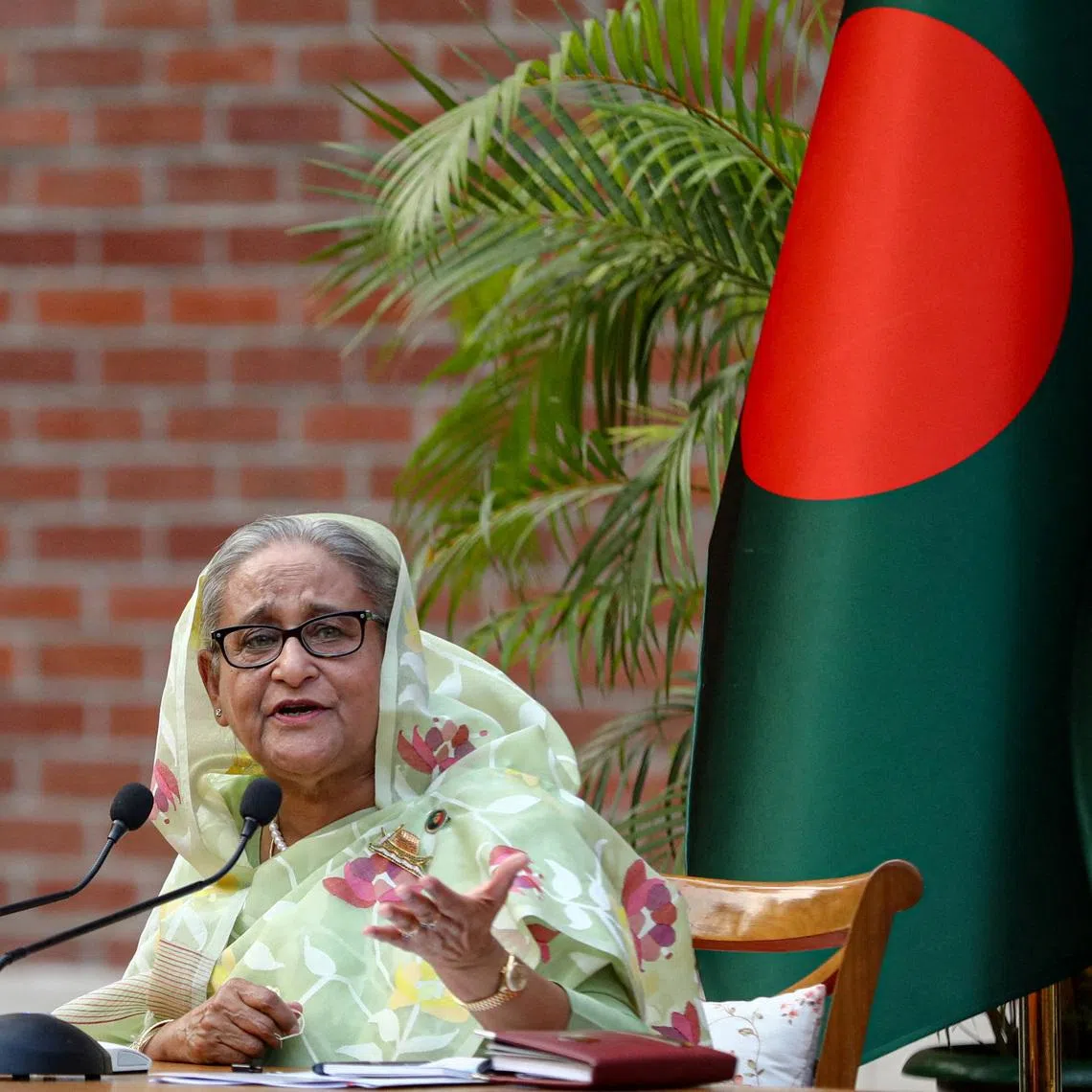 FILE PHOTO: Sheikh Hasina speaks during a meeting with foreign observers and journalists at the Prime Minister's residence in Dhaka, Bangladesh, January 8, 2024. REUTERS/Mohammad Ponir Hossain/File Photo