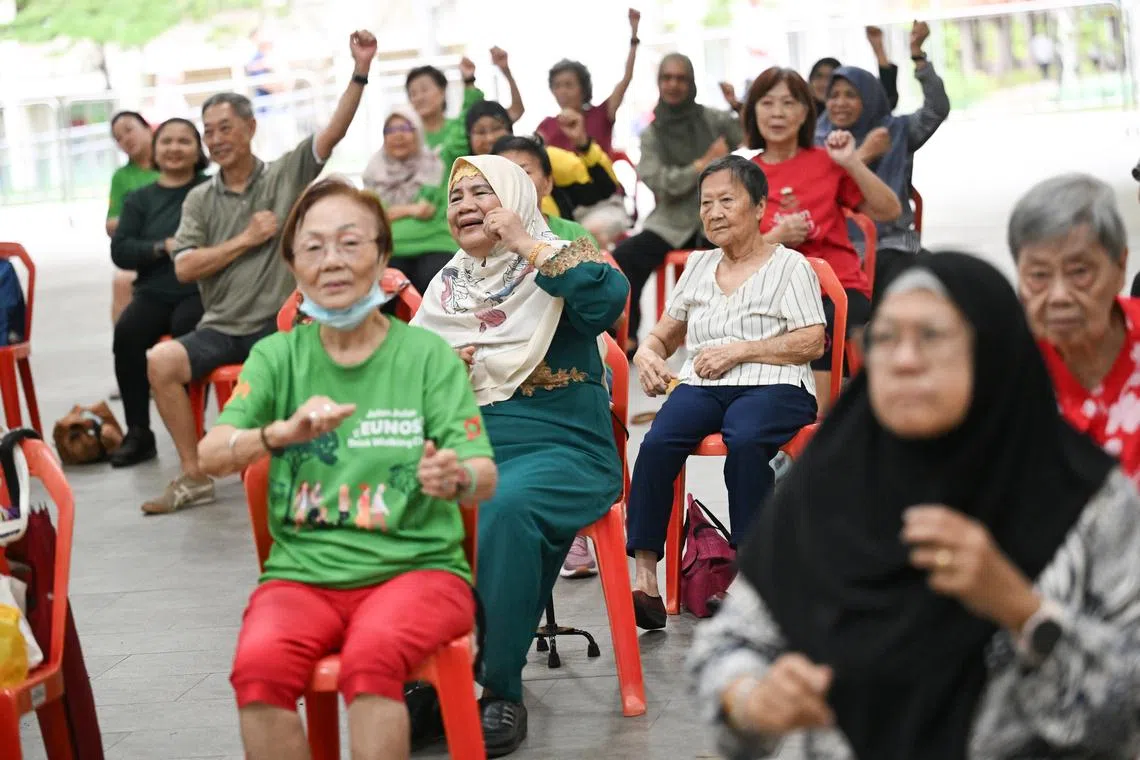 Keeping seniors in Eunos active through chair Zumba and brisk walking sessions