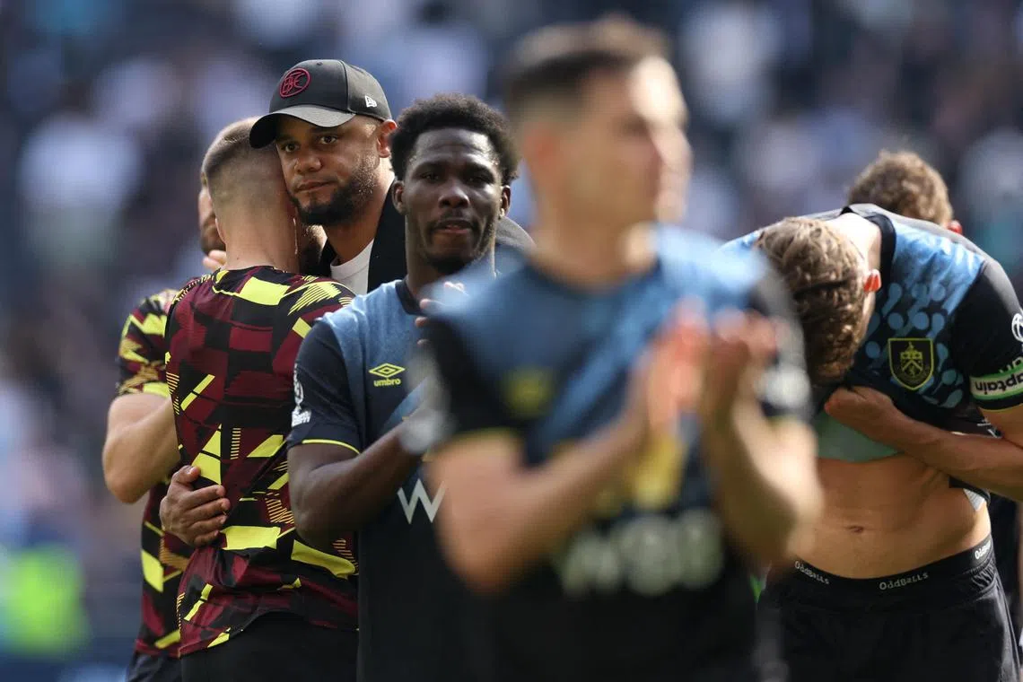Kompany consoled his heart-broken players on the pitch after the final whistle as the grim reality of relegation washed over them.