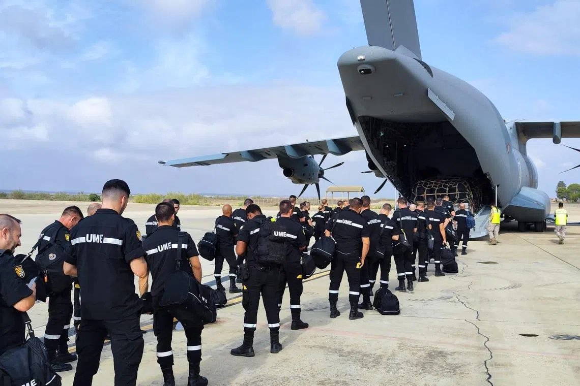 Members of the Spanish Military Emergency Unit boarding an Airbus A400 military plane on Sept 10 to aid with rescue efforts in Morocco.