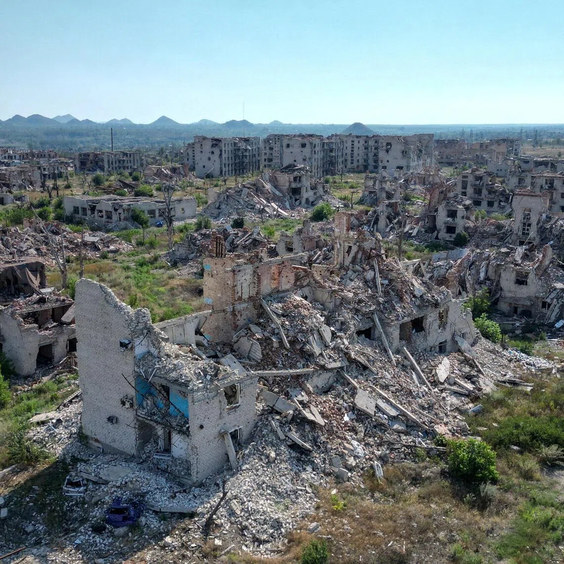 A drone view shows the ruins of residential buildings in the abandoned town of Marinka, which was destroyed in the course of Russia-Ukraine conflict in the Donetsk region, a Russian-controlled area of Ukraine.