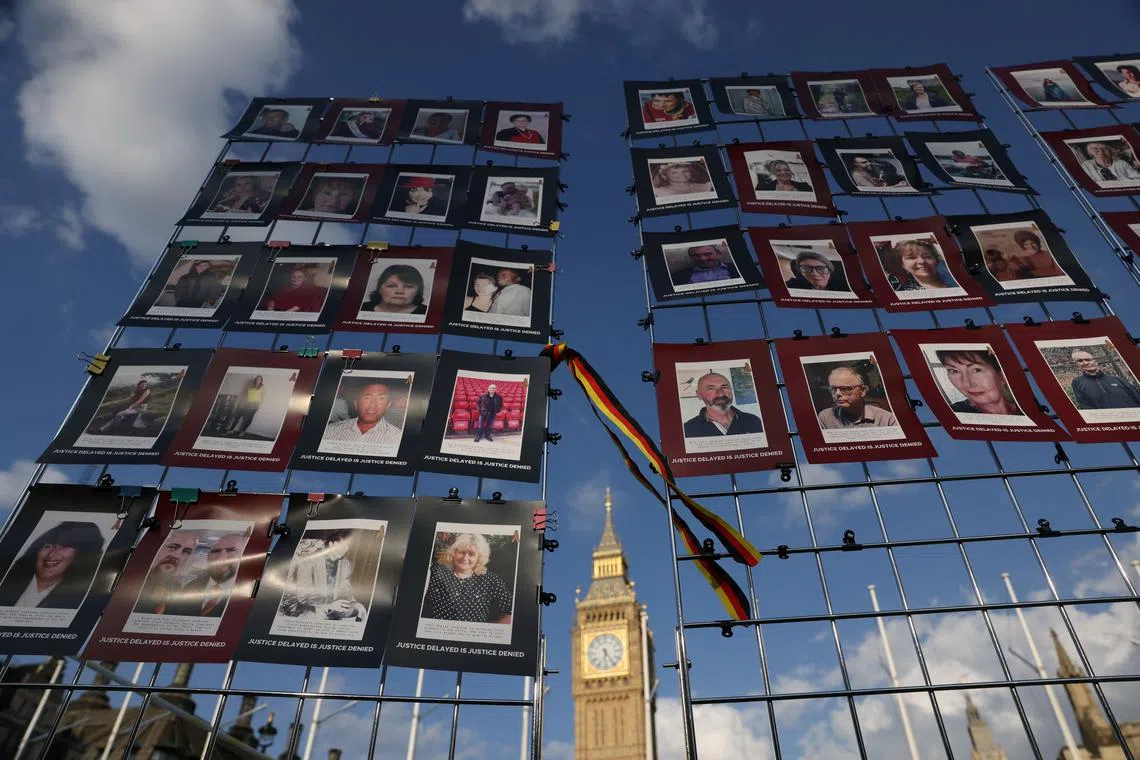 FILE PHOTO: Images of victims of the contaminated blood scandal are displayed during a vigil to remember those that lost their lives, ahead of the release of final report of the Infected Blood Inquiry on Monday, in London, Britain, May 19, 2024. REUTERS/Hollie Adams/File Photo