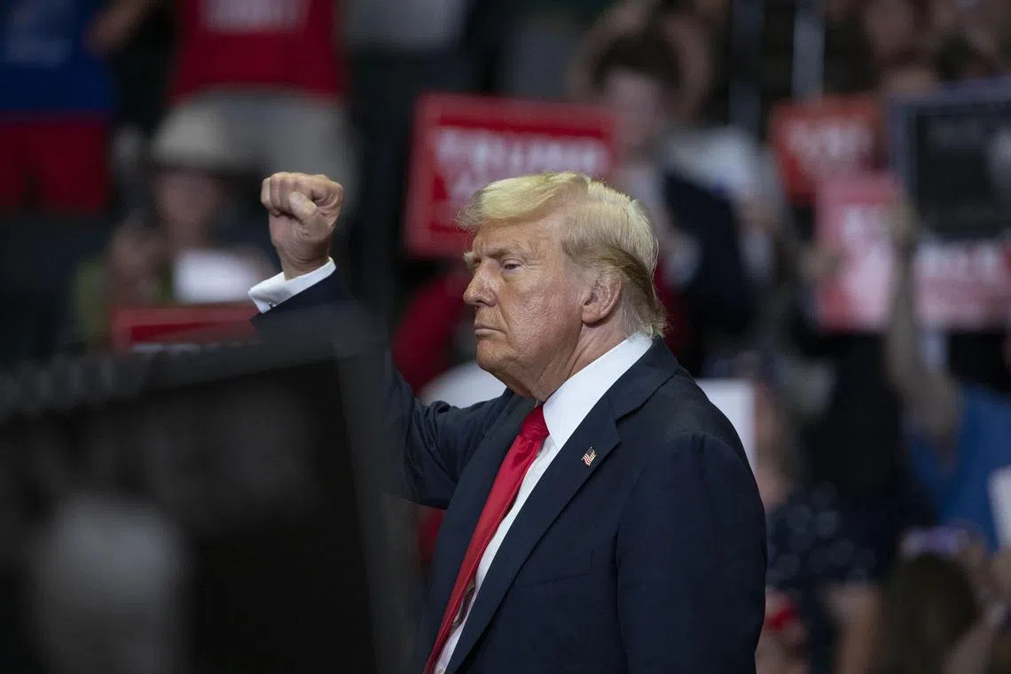 GRAND RAPIDS, MICHIGAN - JULY 20: Republican Presidential nominee, former US President Donald J. Trump holds his first public campaign rally with his running mate, Vice Presidential nominee U.S. Senator J.D. Vance (R-OH) (not pictured), at the Van Andel Arena on July 20, 2024 in Grand Rapids, Michigan. This is also Trump's first public rally since he was shot in the ear during an assassination attempt in Pennsylvania on July 13. Photo by Bill Pugliano/Getty Images) (Photo by BILL PUGLIANO / GETTY IMAGES NORTH AMERICA / Getty Images via AFP)