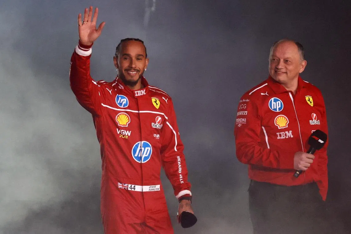 Ferrari's Lewis Hamilton with team principal Frederic Vasseur during the Formula One 2025 season launch.