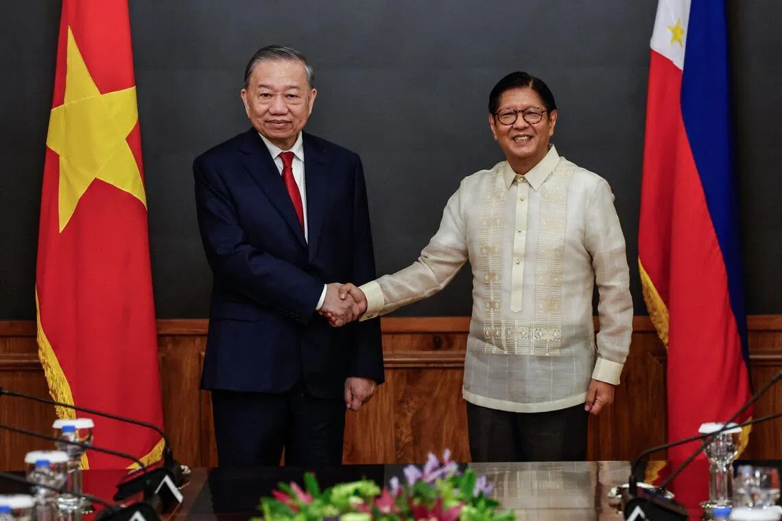 Vietnam's top leader To Lam and Philippines' President Ferdinand Marcos Jr. shake hands during a bilateral meeting at Malacanang Presidential Palace in Manila on June 1.