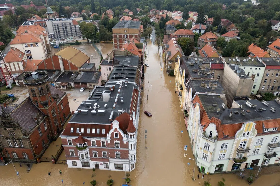 FILE PHOTO: General view taken by drone of a flooded area by Nysa Klodzka river in Nysa, Poland September 16, 2024. REUTERS/Kacper Pempel/File Photo