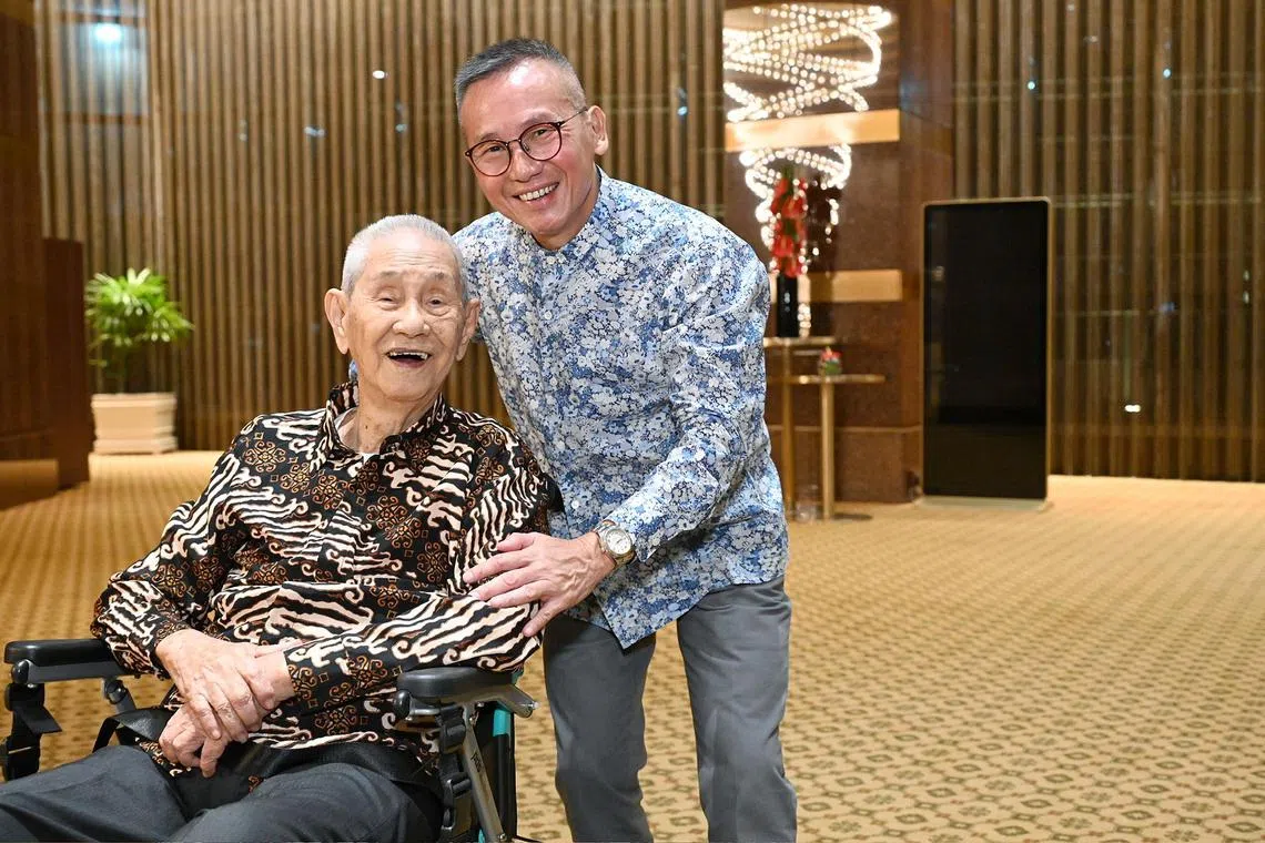 Artist Lim Tze Peng, 102, with Mr Woon Tai Ho, who won the inaugural Dr Alan H.J. Chan Spirit of Singapore Book Prize for Soul Of Ink: Lim Tze Peng At 100. 