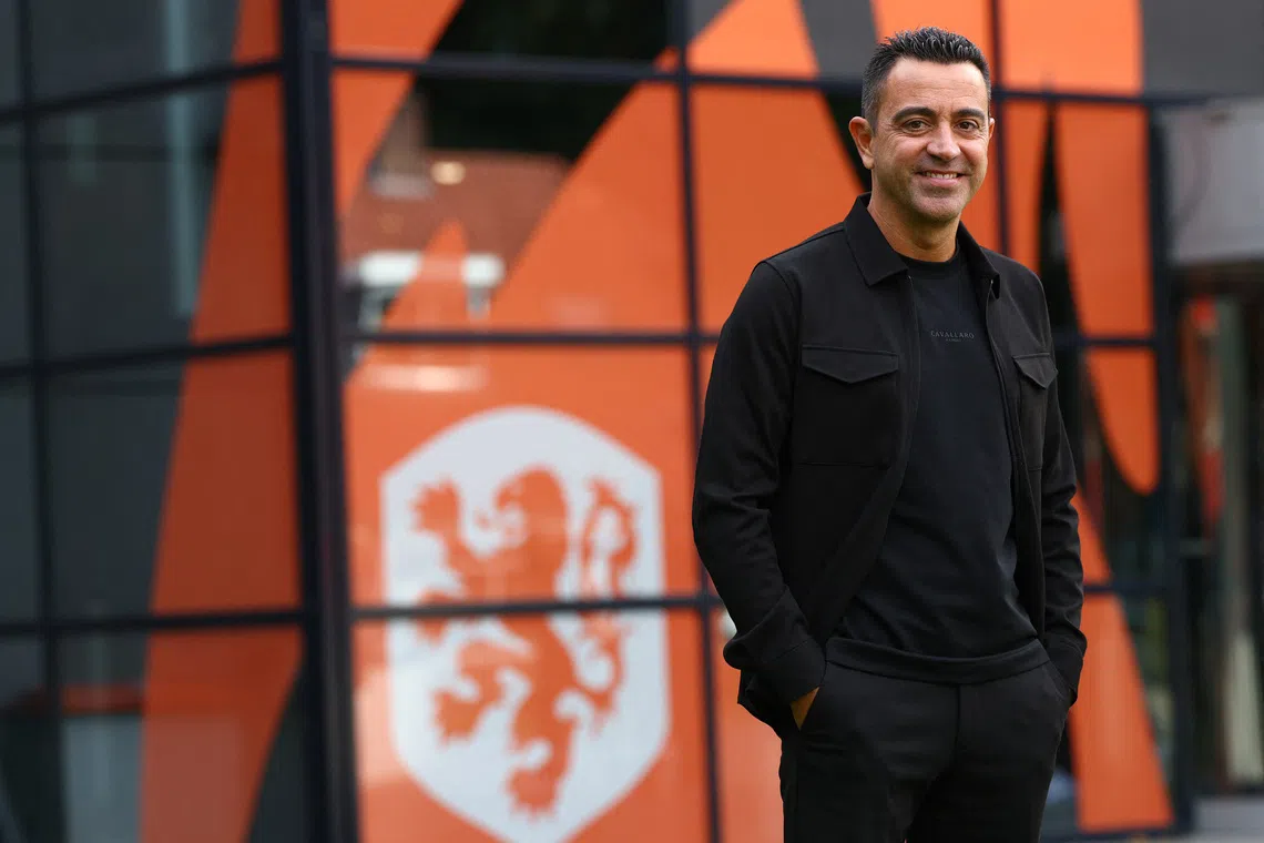 Soccer Football - Netherlands unveil Xavi Hernandez as new coach - KNVB Campus, Zeist, Netherlands - August 25, 2026 Netherlands coach Xavi Hernandez poses for a picture REUTERS/Piroschka Van De Wouw