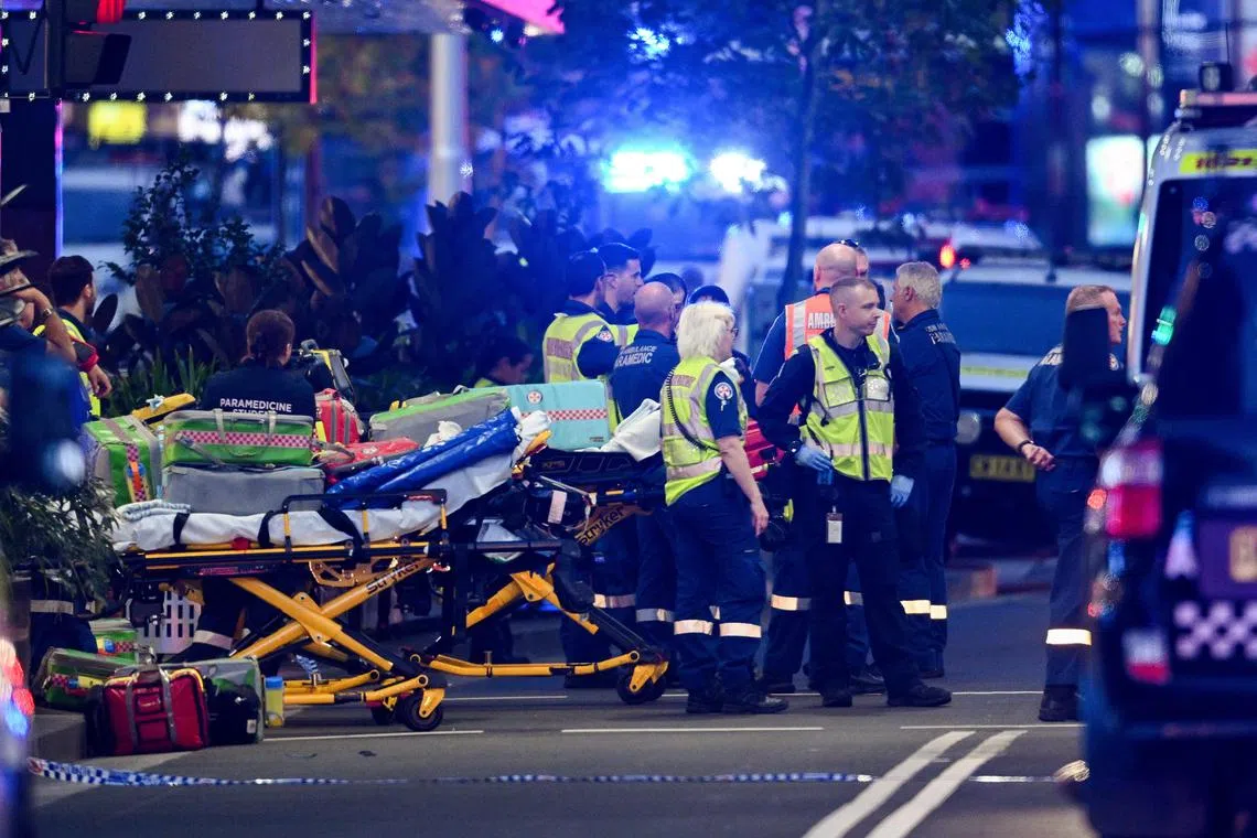 Police and emergency services are seen at Bondi Junction after police responded to reports of multiple stabbings inside the Westfield Bondi Junction shopping centre in Sydney on April 13.
