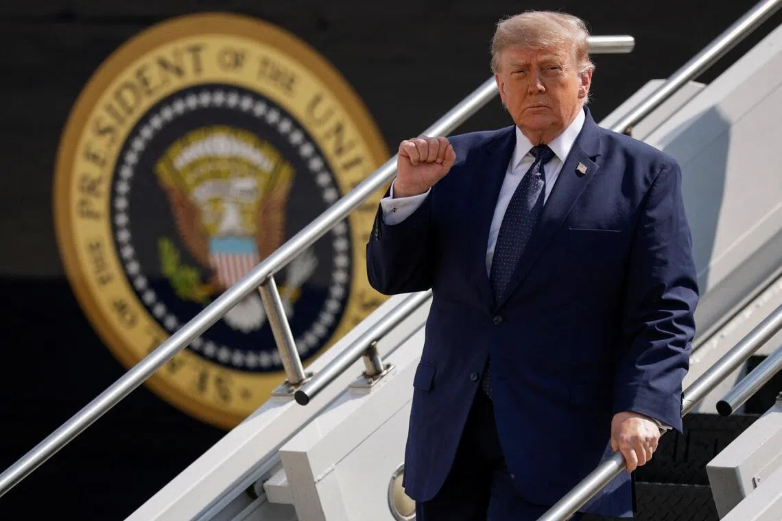 U.S. President Donald Trump gestures, as he disembarks the new Qatari-gifted Air Force One, while he arrives at John F. Kennedy International Airport in New York City, U.S., July 17, 2026. REUTERS/Evan Vucci