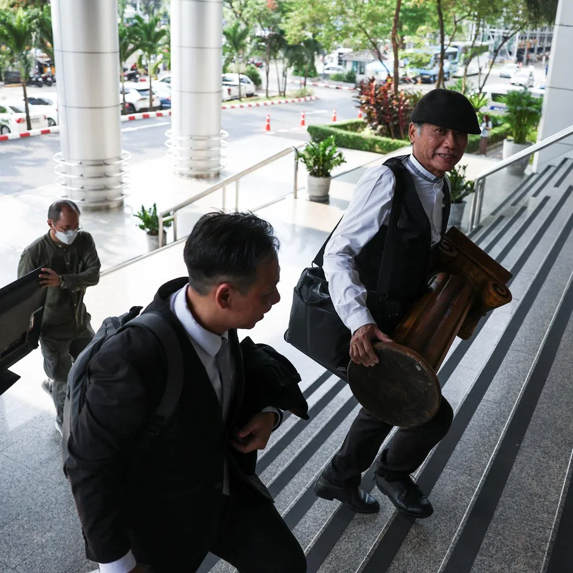 Kungwal Buddhivanid, 62, arrives before the hearing of his petition to revive the case of the death of King Ananda Mahidol or Rama VIII, at the criminal court in Bangkok, Thailand, April 4, 2024. REUTERS/Chalinee Thirasupa