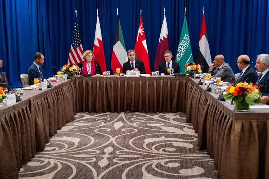 FILE PHOTO: U.S. Secretary of State Antony Blinken attends breakfast with the Foreign Ministers of the Gulf Cooperation Council Nations, Monday, Sept. 18, 2023, in New York, U.S.  Third from left is Oman Foreign Minister Badr bin Hamad bin Hamoud Al-Busaidi and fourth from right is Gulf Cooperation Council Secretary General Jasem Mohamed AlBudaiwi.     Craig Ruttle/Pool via REUTERS/file photo
