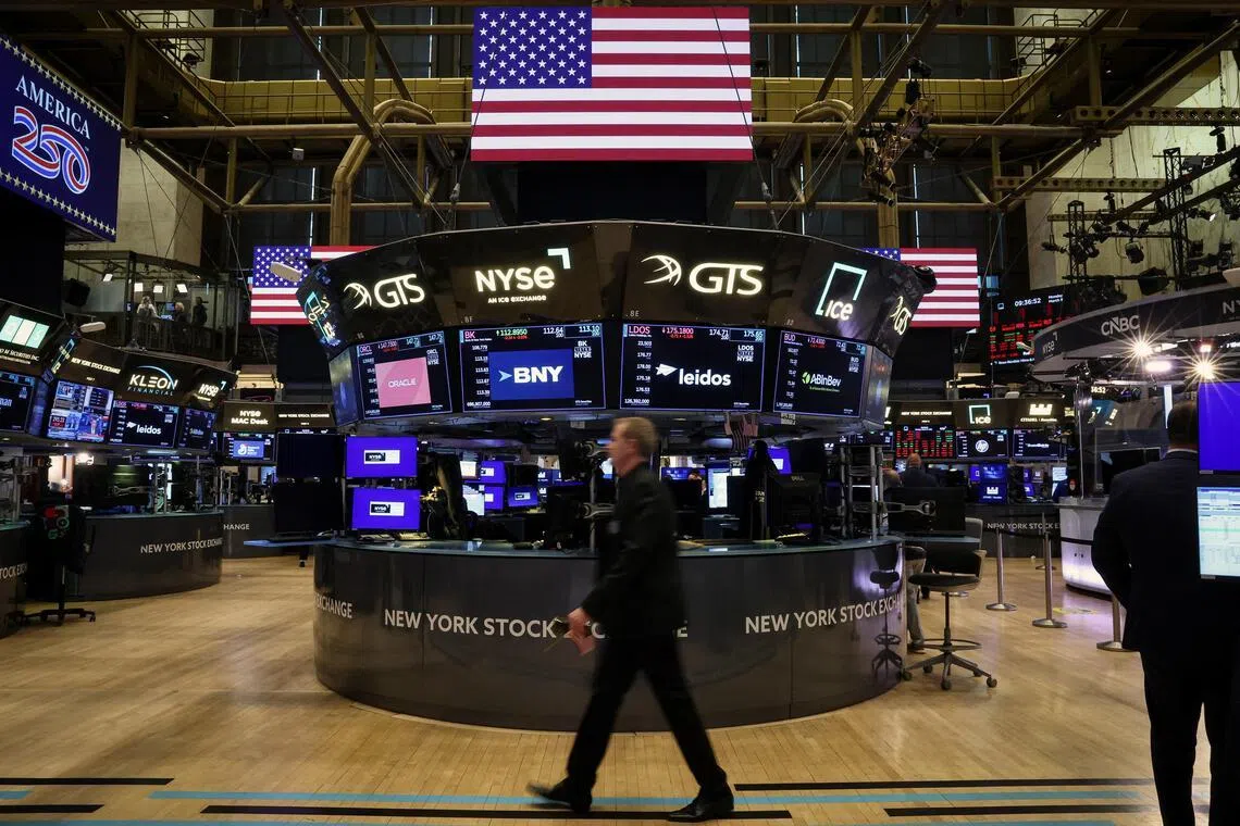Traders working on the floor of the New York Stock Exchange, in New York City, on March 9.