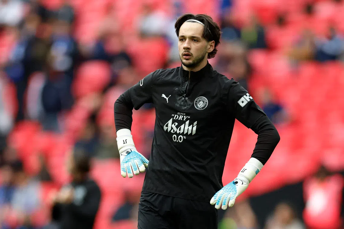 Soccer Football - FA Cup - Final - Chelsea v Manchester City - Wembley Stadium, London, Britain - May 16, 2026 Manchester City's James Trafford during the warm up before the match Action Images via Reuters/Peter Cziborra