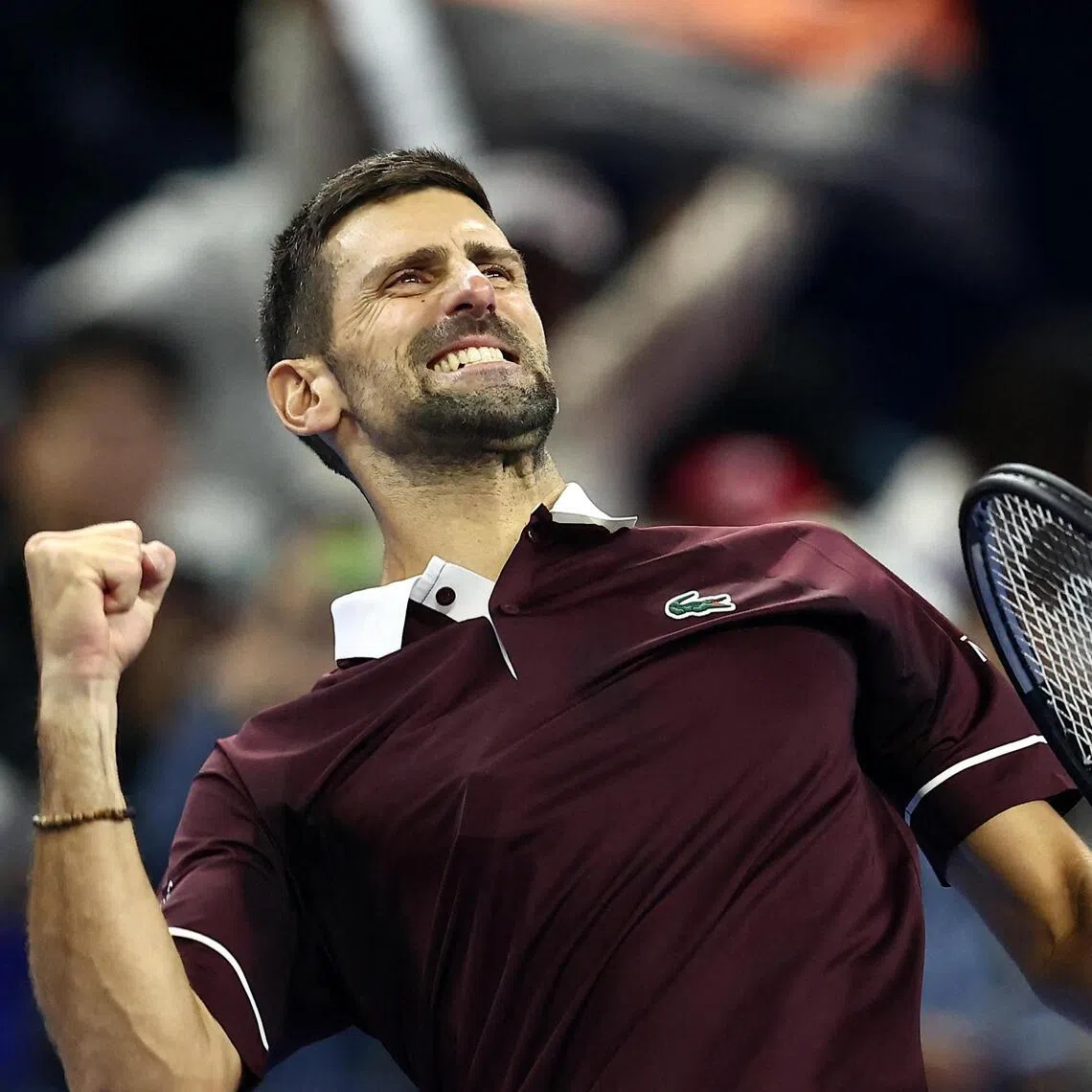 Serbia’s Novak Djokovic celebrates winning his round of 16 match against China’s Bu Yunchaokete on Oct 2.