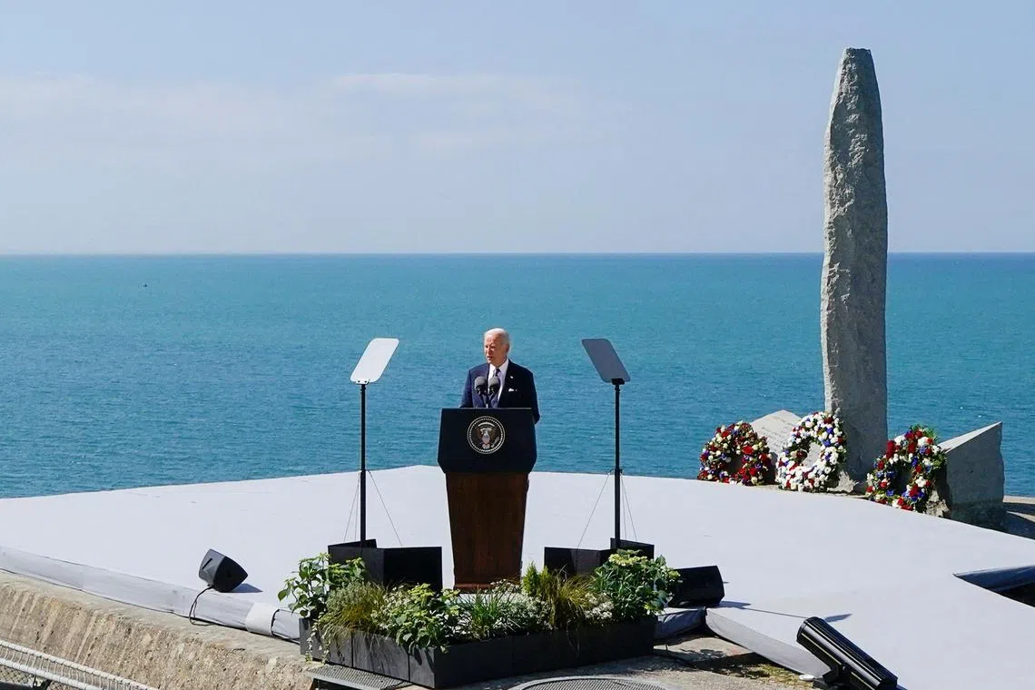US President Joe Biden delivering his speech at the World War II Pointe du Hoc Ranger Monument, in Normandy, France, on June 7.