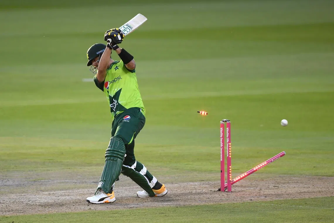 FILE PHOTO: Cricket - Third T20 International - England v Pakistan - Emirates Old Trafford, Manchester, Britain - September 1, 2020  Pakistan's Haider Ali is bowled out by England's Chris Jordan  Mike Hewitt/Pool via REUTERS/File Photo