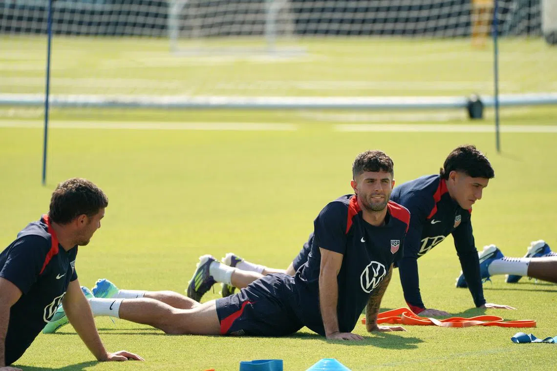 US Men's National Team forward Christian Pulisic (centre) stretches during the United States training session in Austin, Texas, on Oct 11.