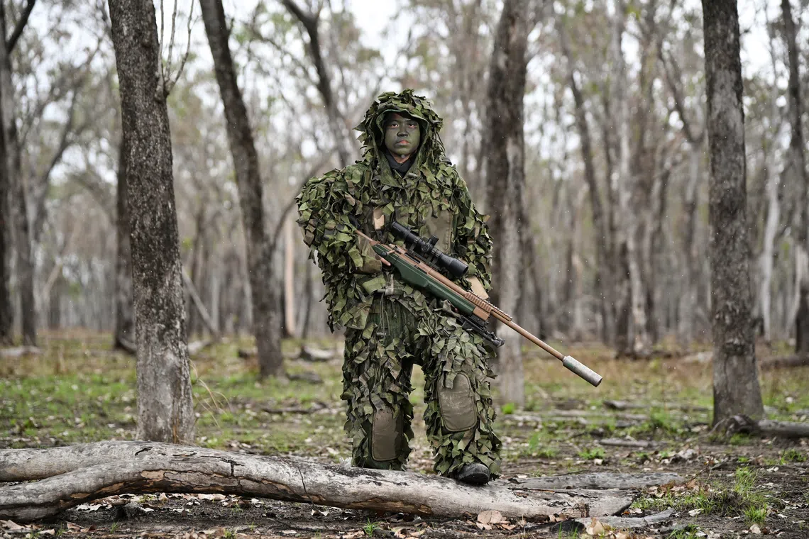 MSG Chin Shi Lee in a ghillie suit on Oct 23.