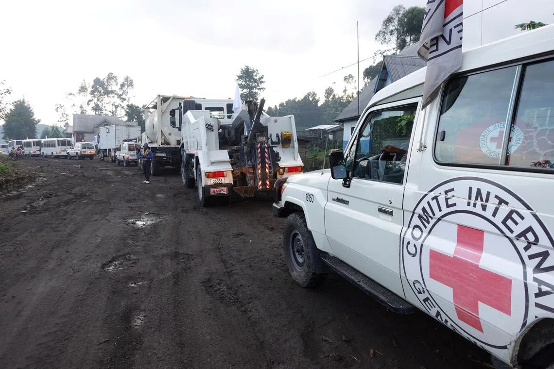 An International Committee of the Red Cross convoy escorts the now-unarmed Congolese soldiers and police officers, as well as their families who sought refuge at the United Nations Organization Stabilization Mission in the Democratic Republic of the Congo (MONUSCO) base since the capture by M23 rebels in January; in Goma, North Kivu province of the Democratic Republic of Congo, April 30, 2025. International Committee of the Red Cross/Handout via REUTERS