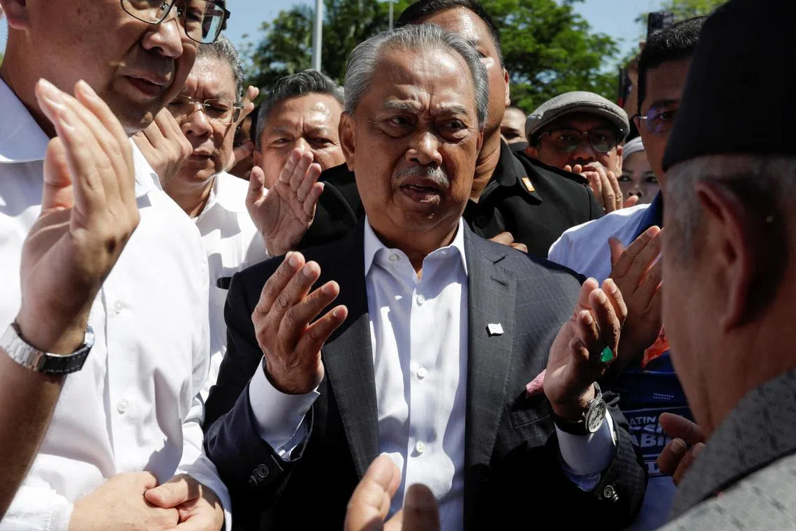 Former Malaysia prime minister Muhyiddin Yassin arrives to give a statement to the Malaysian Anti-Corruption Commission (MACC) in Putrajaya, on March 9, 2023.