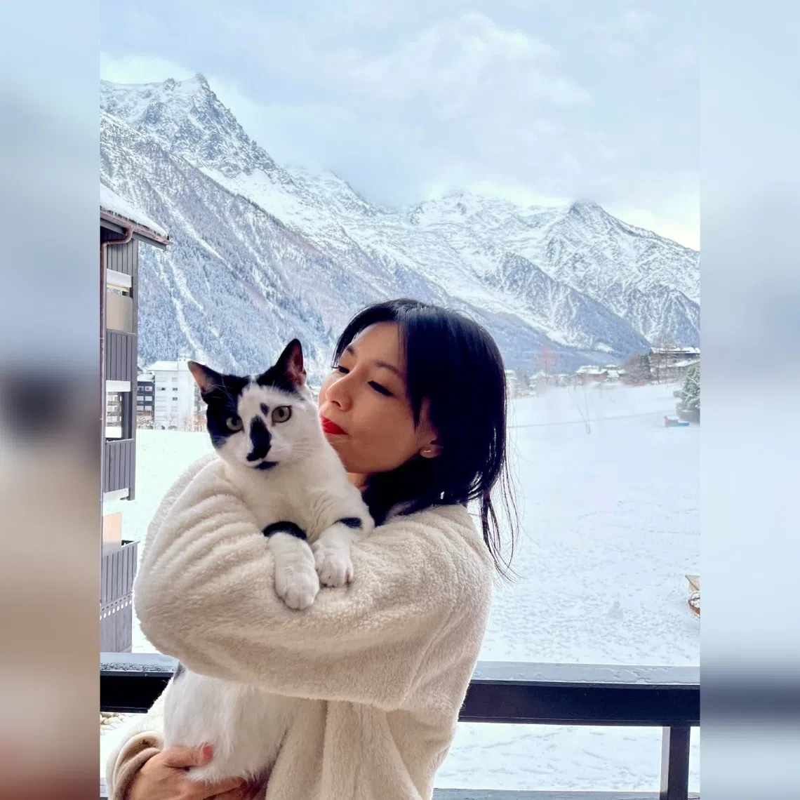 Sharon Au at the chalet in ski resort of Chamonix, with her cat Rudon.