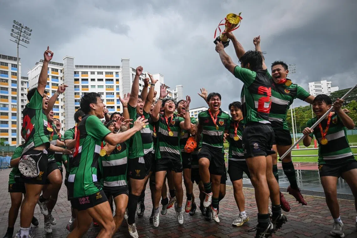 Raffles Institution’s rugby team celebrate after their win against Anglo-Chinese School (Independent) at the A division NSG Rugby finals at Jurong West Stadium on April 28, 2026.