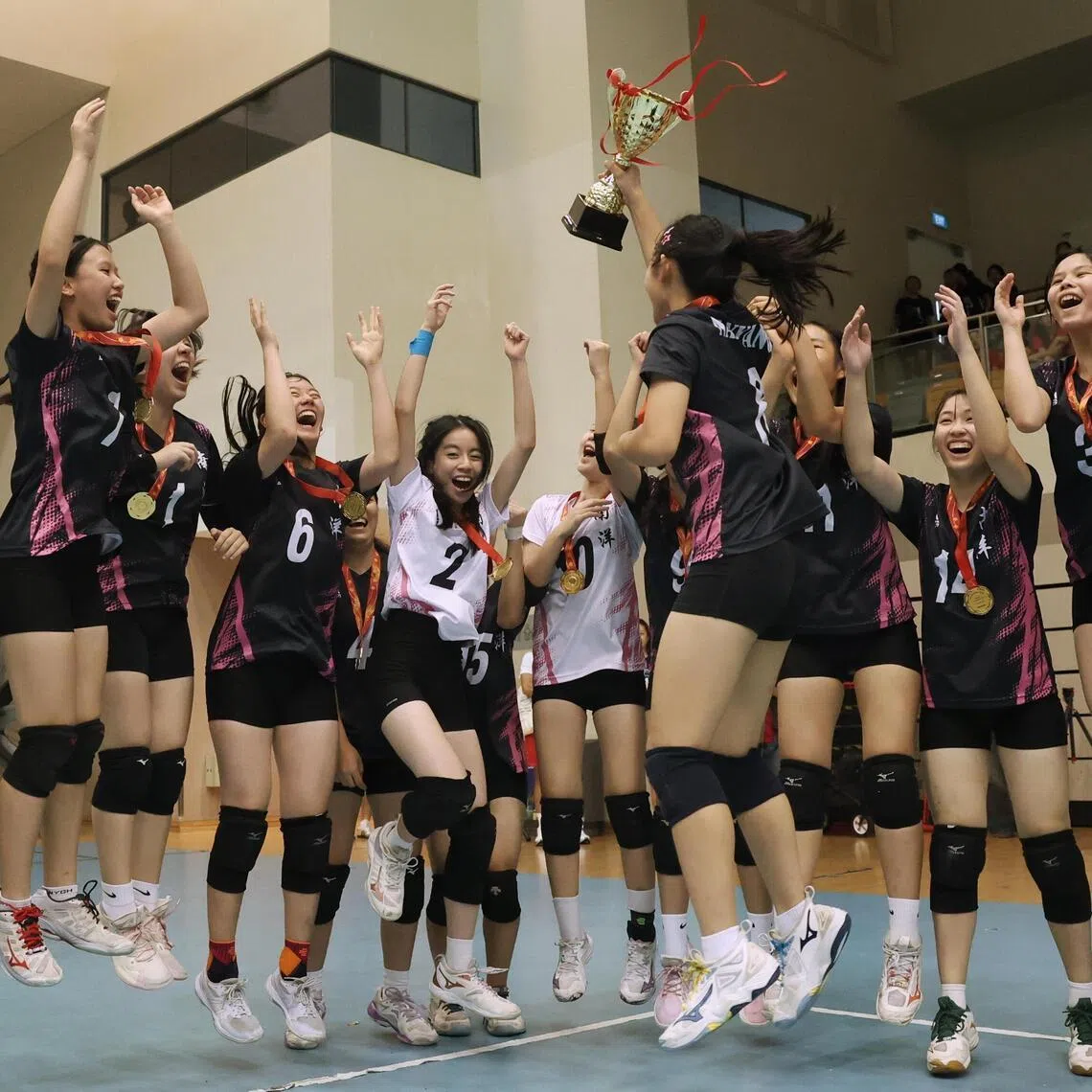 Nayang Girls' High School celebrate after winning the National School Games B Division Volleyball Final held at Our Tampines Hub on May 4, 2026