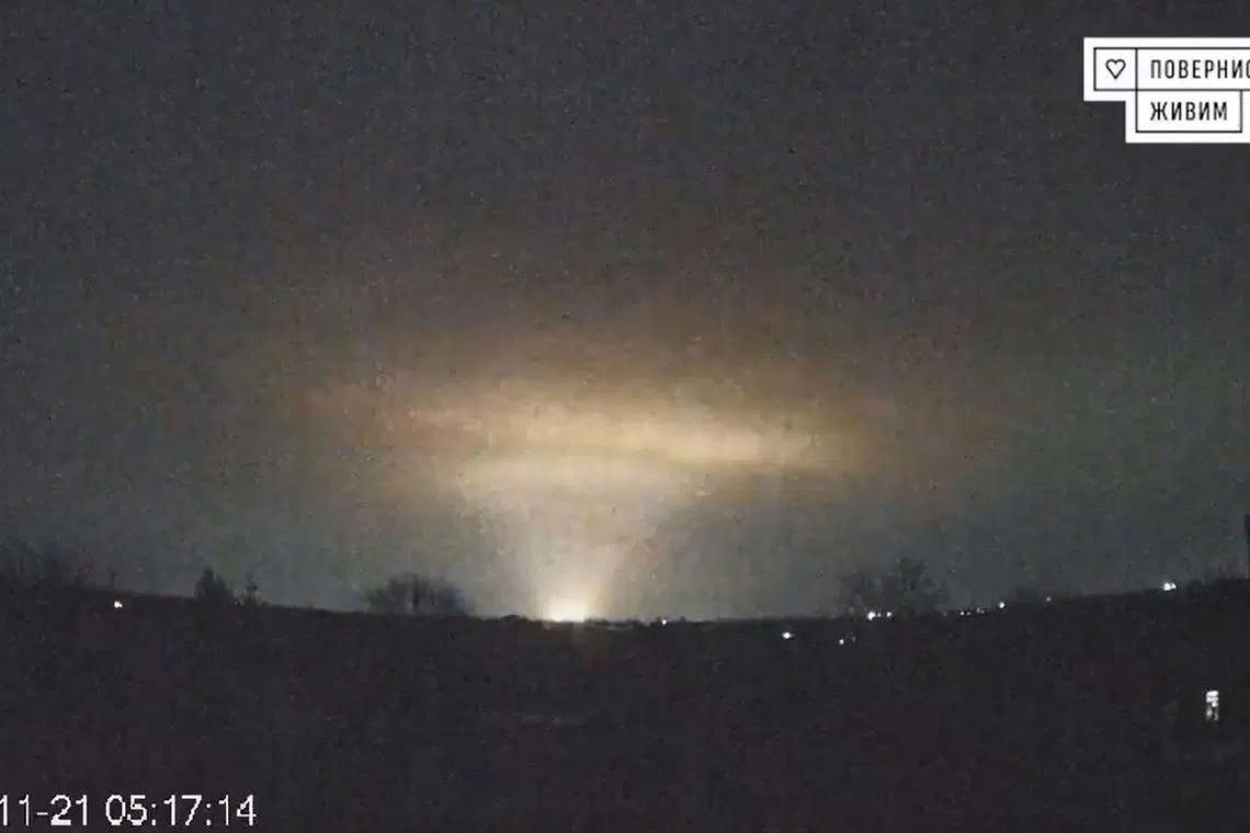 A screengrab from an online video showsing flashes over the Ukrainian city of Dnipro, on Nov 21.